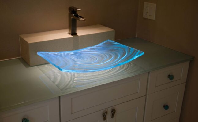 Novel Custom Glass Sink with Textured Glass LED light by Downing Designs in Tampa Florida downlighted