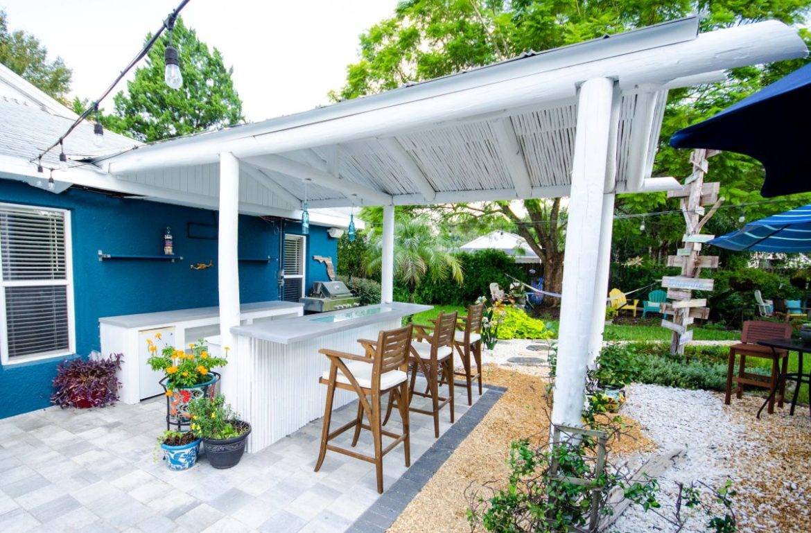 Tropical Outdoor Kitchen and Bar with Glass Countertops Downing Designs