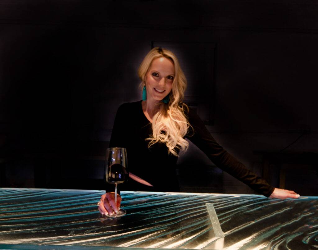 woman-black-dress-at-bar-illuminating-glass-countertops-2