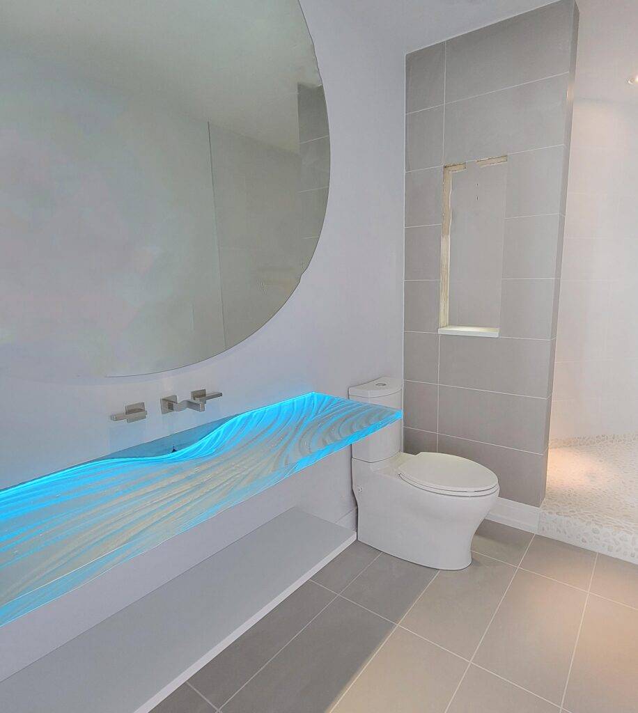 glass sink with integrated sink and LED lighting