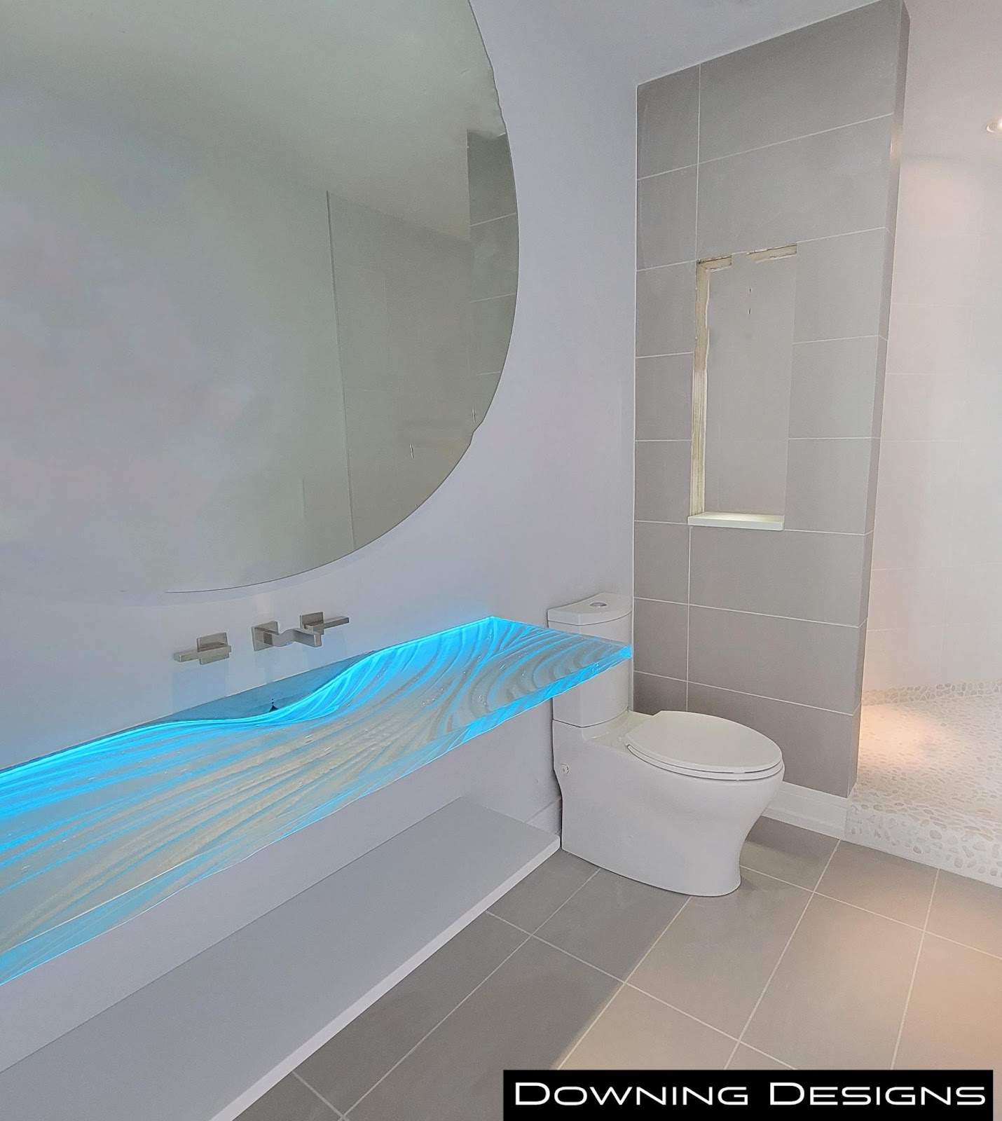 Flaoting Glass Sink by Downing Designs in Tampa, FL with LEDs and backpaint.
