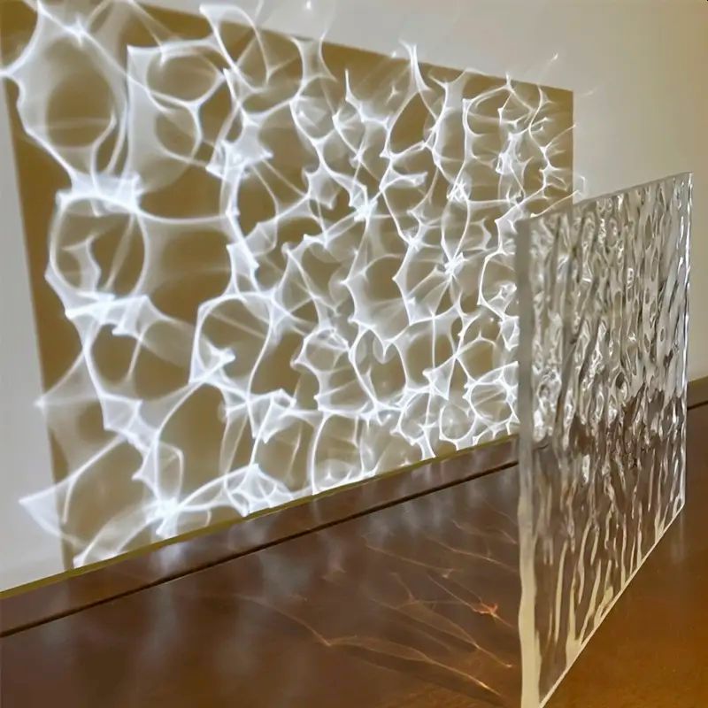 Cast Glass refraction pattern on wall 