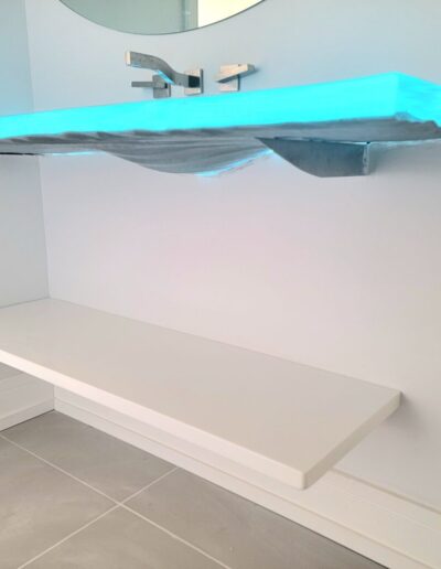 Underside of floating glass sink by Downing Designs
