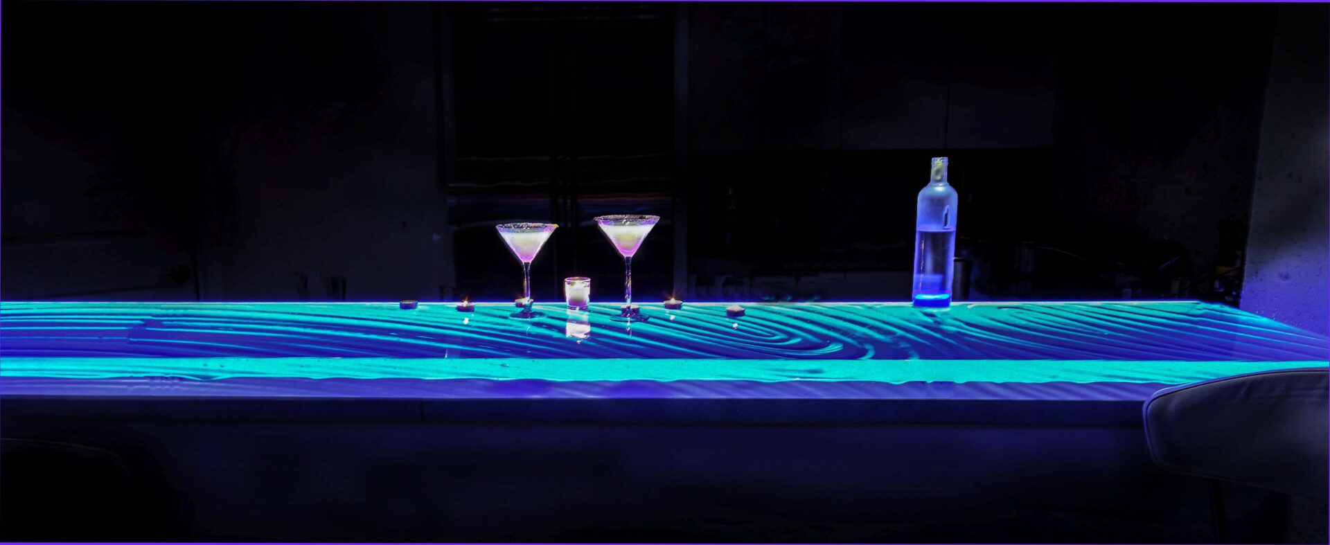 Glass Bar Top with LED Ambiance Machine in Tampa, Florida Downing Designs s custom-glass-bar-top-channelside-tampa-downing-designs