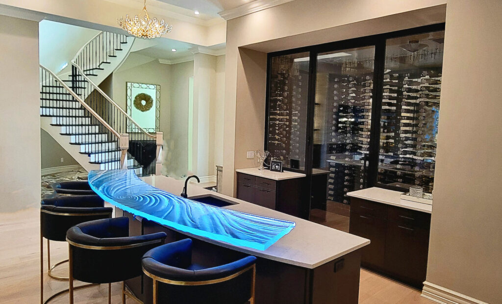 Custom arced glass high bar floating on cantilevered supports Naples Florida luxury home wine room — Downing Designs Tampa