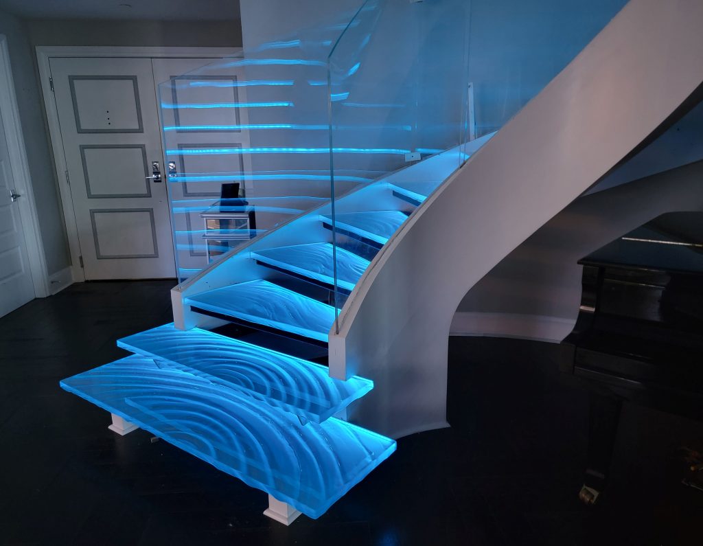 Glass stair treads st Petersburg Florida spiral staircase view from ground 
