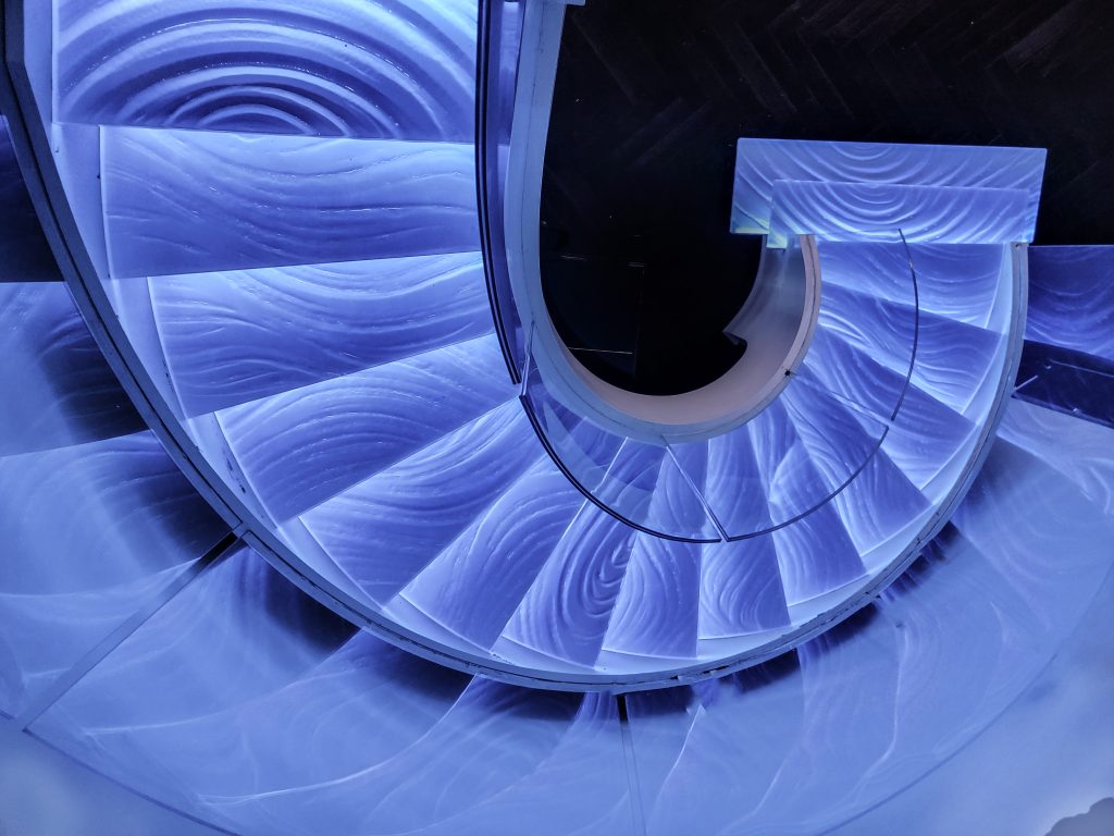 Glass stair treads st Petersburg Florida spiral staircase view from above 
