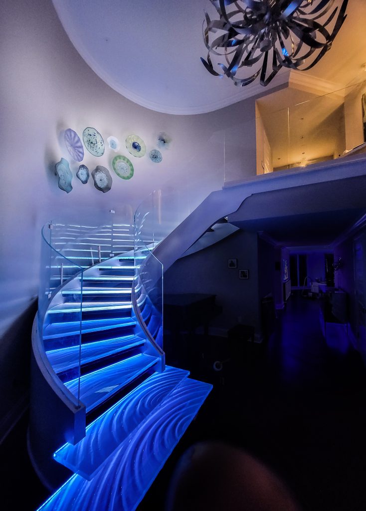 St Petersburg, Florida custom spiral glass stair treads and landing