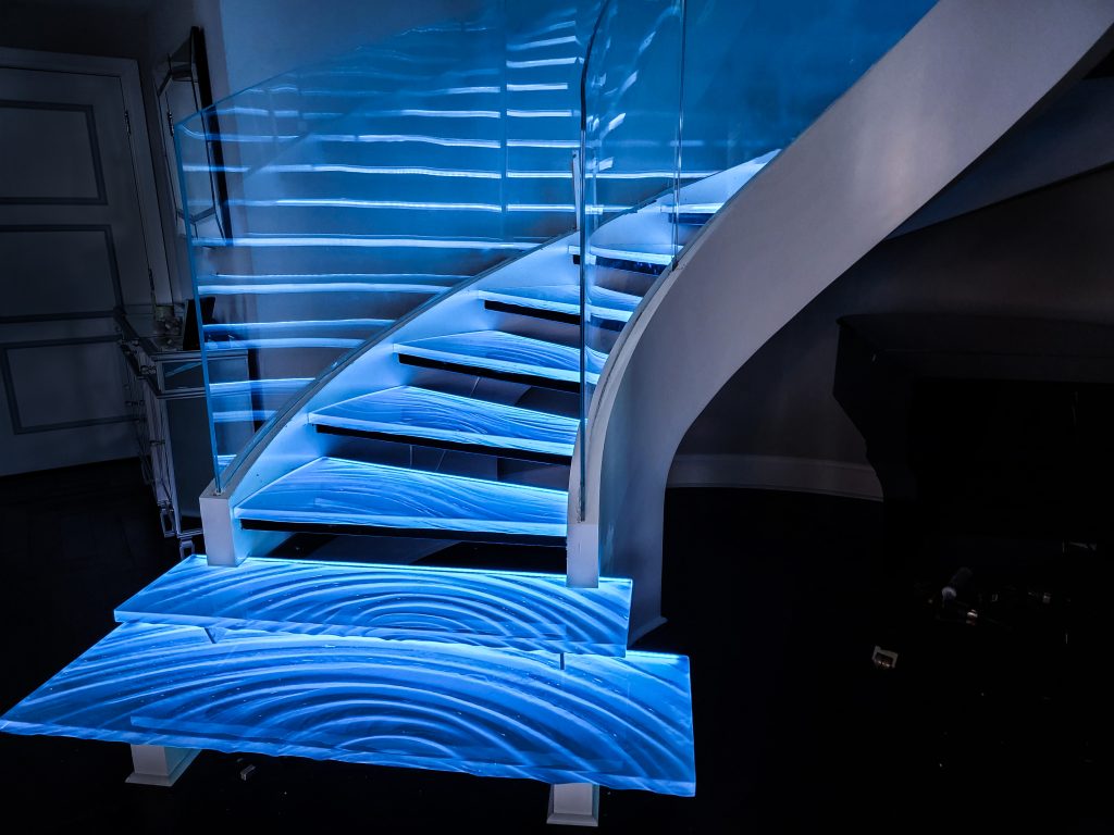 St Petersburg, Florida custom glass stair treads spiral staircase landing