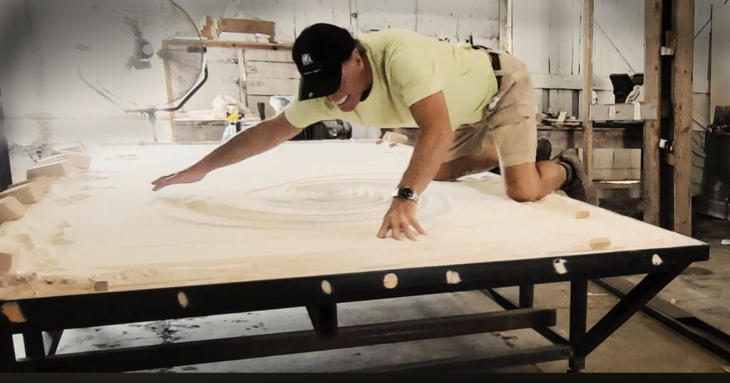 Jeff Downing Downing Designs designing large Glass Bar Top in his Tampa, FL studio