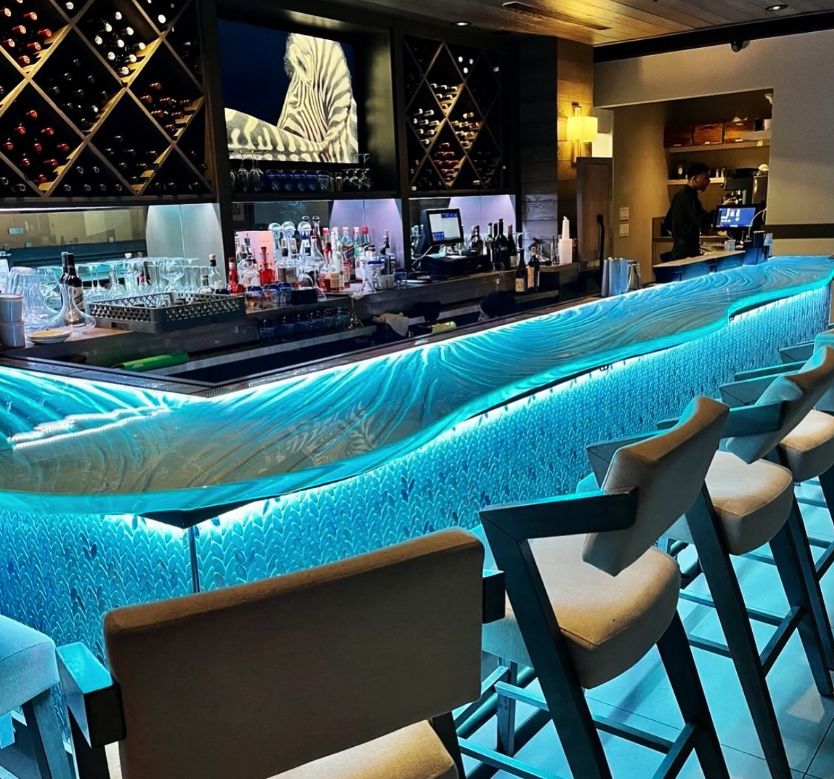 Efge profile of Illuminated custom glass bar tops at Acqua Cafe restaurant in West Palm Beach Florida by Downing Designs