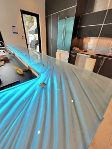 Custom L shaped glass bar top installation St Petersburg Florida