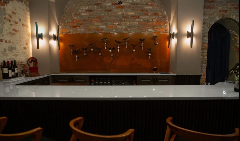 white glass bar top sky puppy tampa downing designs