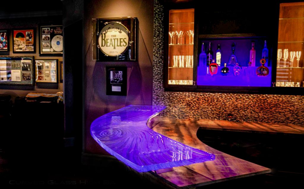 Custom low-iron glass bar top in Naples Florida luxury residence, designed and fabricated by Downing Designs Tampa