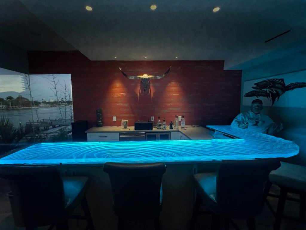 Custom L-shaped glass bar top Treasure Island Florida RGB LED illuminated — Downing Designs