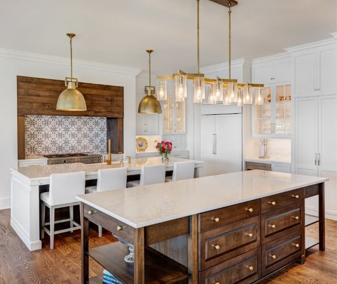 Kiln-formed white glass island countertops by Downing Designs in a luxury lakefront kitchen renovation, Cornelius, North Carolina — Lake Norman — Augusta Homes build
